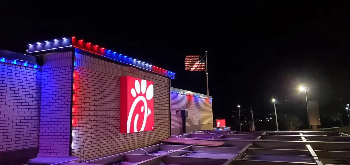 Trimlight permanent lighting on a commercial building
