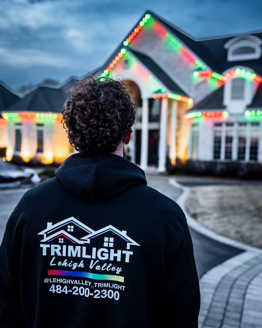 Danny, owner of Lehigh Valley Trimlight, admiring a finished permanent lighting installation